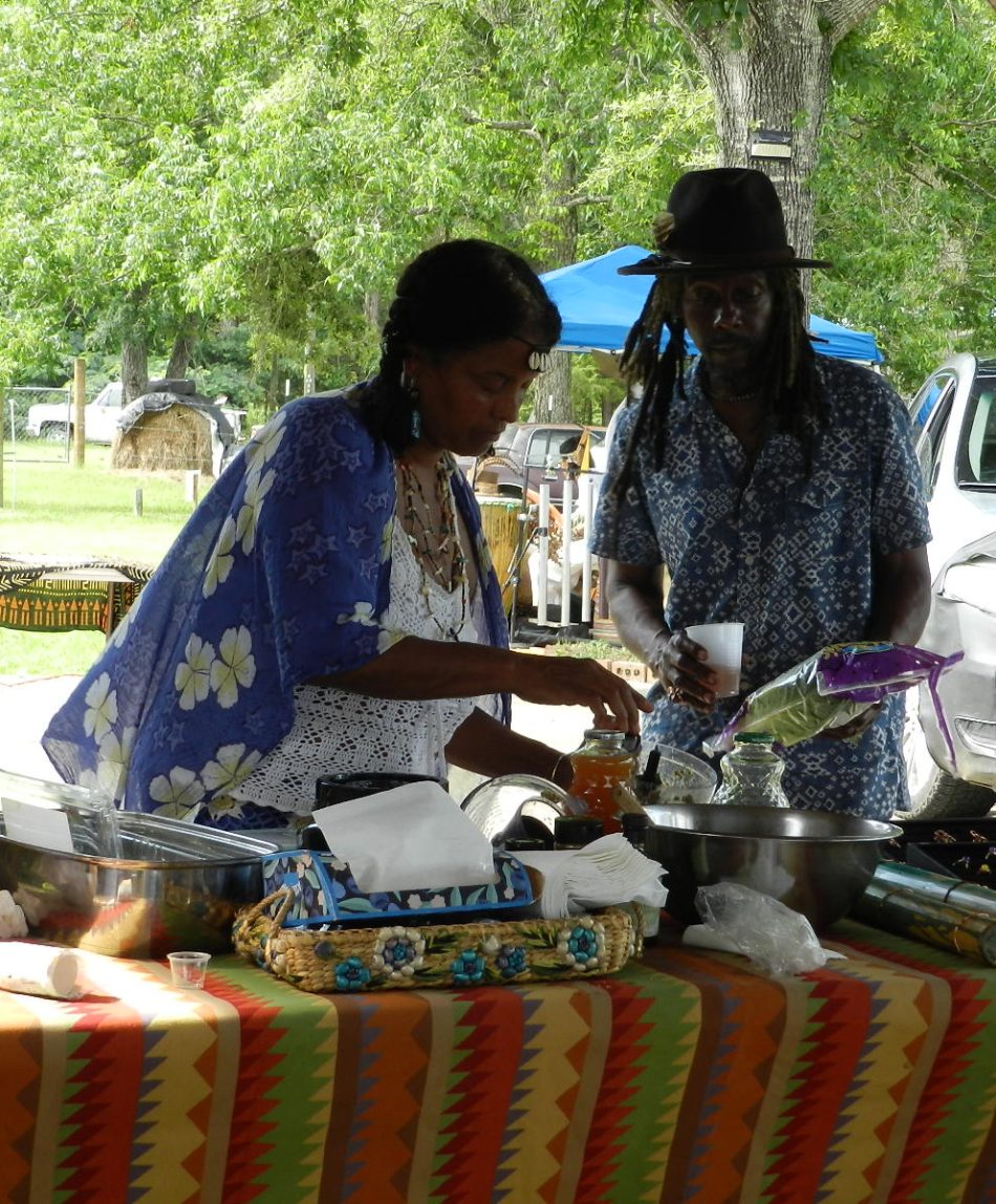 Cheryl and Jahi prepping RawSoulicious food